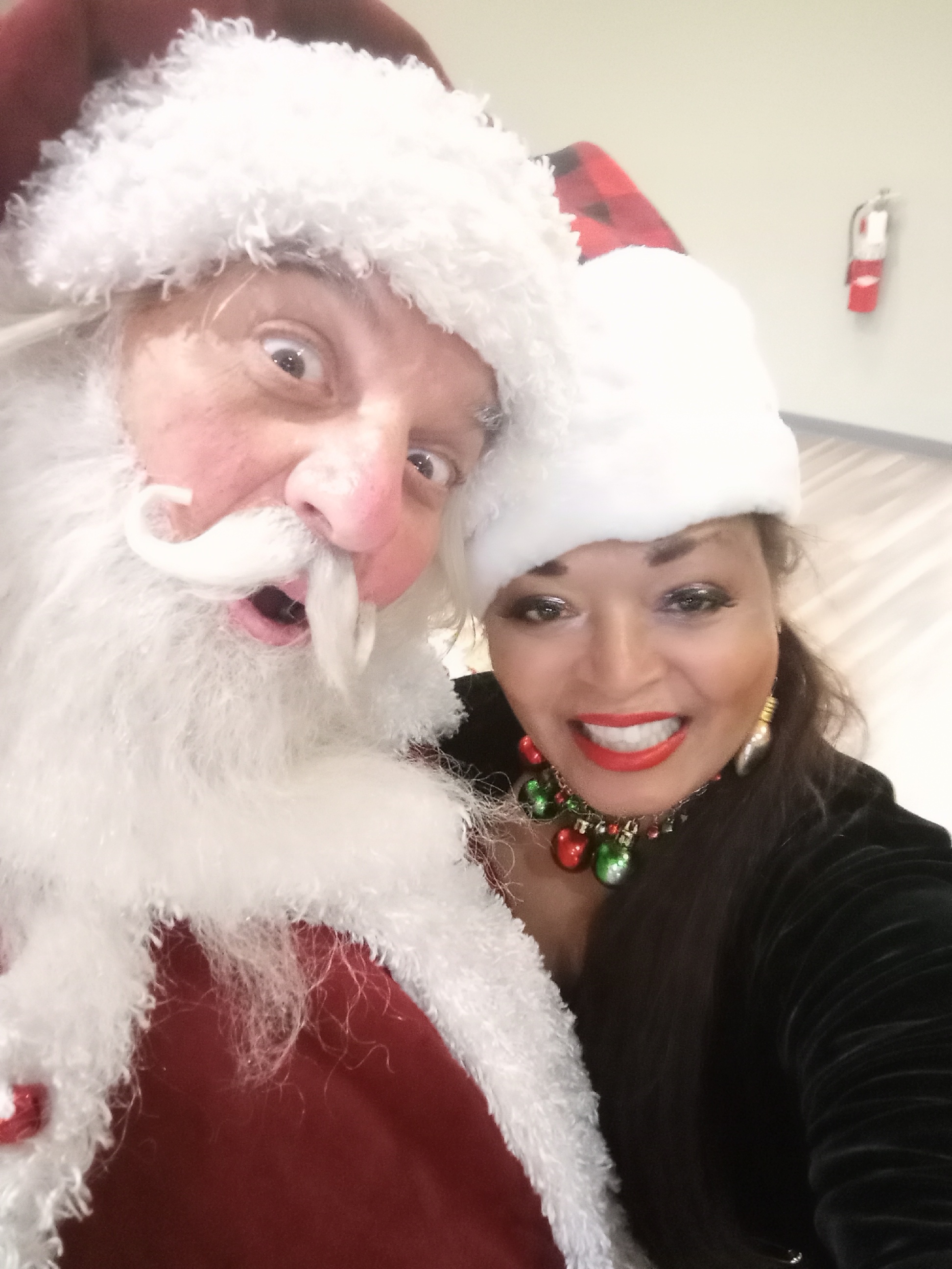 Silly Picture with Holiday Santa Claus and Linda Miller