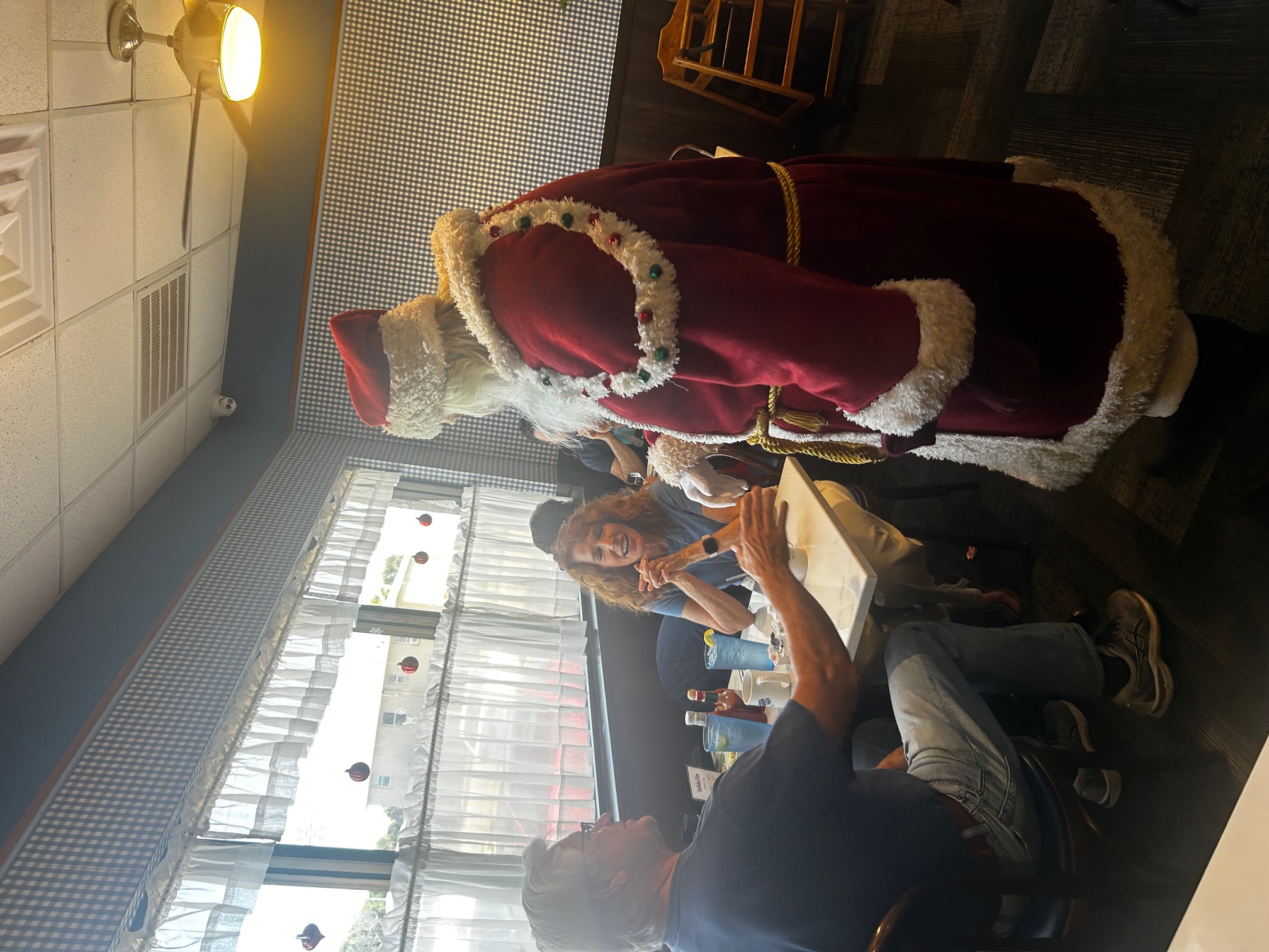 Holiday Santa Claus visits Blueberry Muffin Restaurant in Indiatlantic 2025